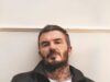 David Beckham fuma ardentemente nel nuovo servizio fotografico per la sua collezione Boss dopo l’attacco di Nicola Peltz alla famiglia del marito Brooklyn – e la reazione tagliente di Romeo