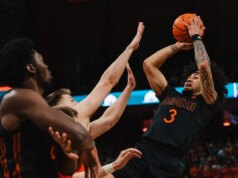 N. 22 Miami fuori per estendere il successo casalingo durante la visita di Louisville