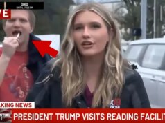 Un uomo sembra masticare una sigaretta accesa in diretta TV durante la visita di Donald Trump in Ohio