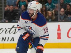 Henrique e Gostisbehere subiscono infortuni nella partita Oilers-Hurricanes