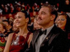 Leonardo DiCaprio fa debuttare i baffi alla “Tom Selleck” e lancia con forza la storia d’amore con Vittoria Ceretti agli Oscar