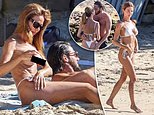 Dina Broadhurst, 50 anni, mette in mostra uno spettacolo molto volgare mentre va in topless in spiaggia e fa le valigie sul PDA con il suo nuovo fidanzato toyboy
