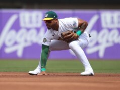 L’Atletica attiva Brent Rooker, DFA INF Andy Ibanez