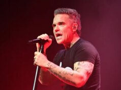 Robbie Williams risponde al podcaster “bullo” dopo commenti feroci