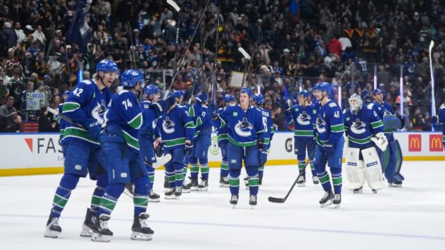 Vancouver-Canucks-players-salute-the-crowd-after-defeating-the-Los-Angeles-Kings.jpg