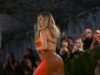 Kim Kardashian stupisce il Met Gala indossando una corazza shade mandarino dello stilista britannico