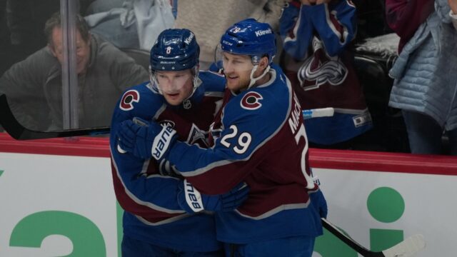 Colorado-Avalanche-defenseman-Cale-Makar-left-congratulates-center-Nathan-MacKinnon.jpg